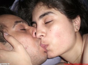 Couple Kissing Photo in bedroom